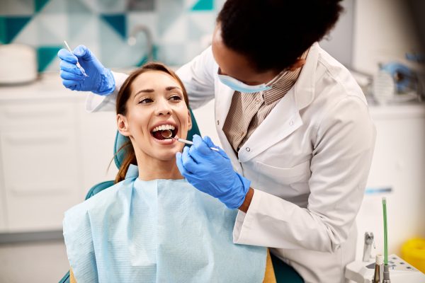 woman gets a dental exam